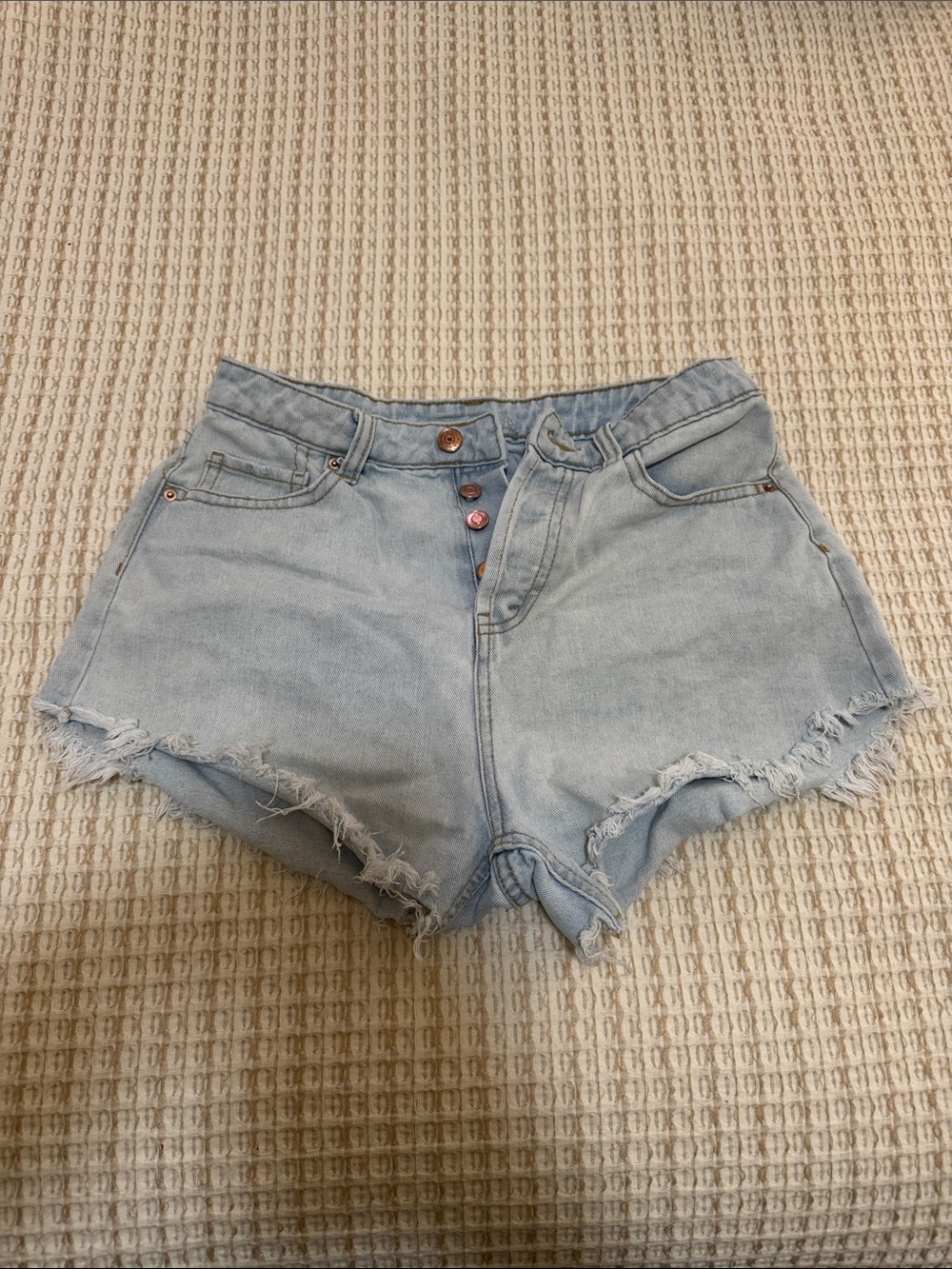 High-Rise Light Blue Denim Cutoff Shorts